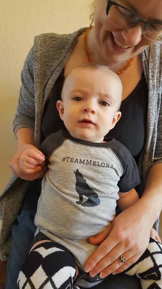 I made custom shirts for my son that were related to the stories my writers' group members had written. Here, he sports his #TeamMelora onesie, which refers to the love triangle in Marie Zhuikov's books, "Eye of the Wolf" and "Plover Landing."